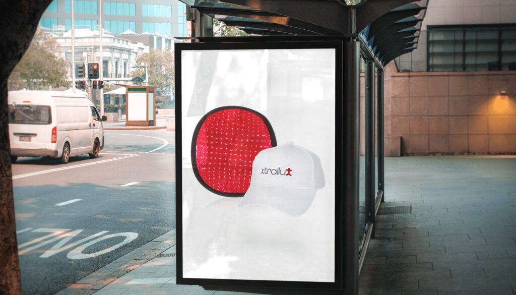 Image of an ad for Xtrallux extreme rx laser cap with 352 laser diodes for LLLT
