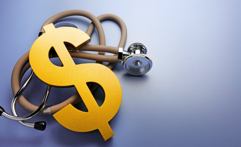 Image depicting the ability to finance a hair transplant displayed as a stethoscope and dollar sign